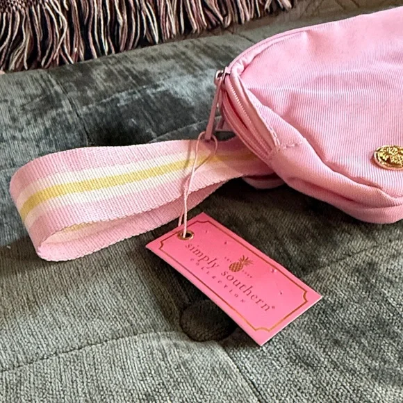 pink canvas crossbody belt bag with striped strap - Picture 2 of 5